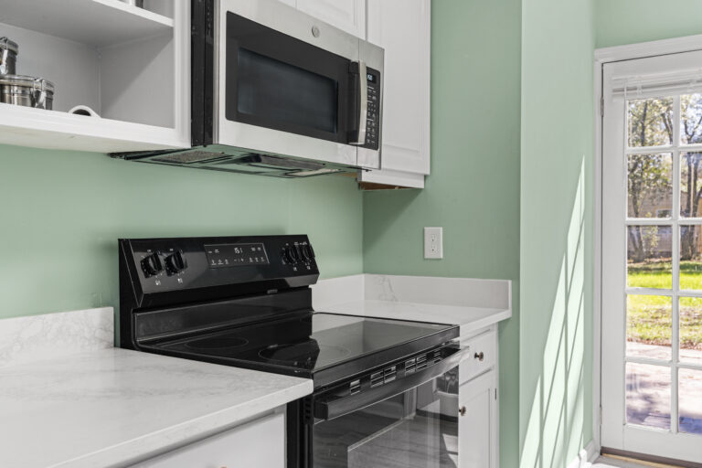 184 30th Ave, Columbus, GA: kitchen: stainless range and microwave
