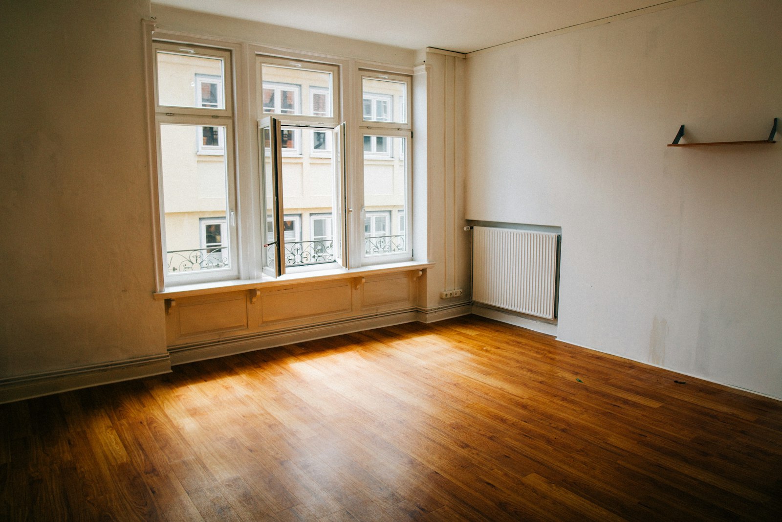 Empty living room in a Columbus, GA home after a PCS move-out, ready for the next tenant